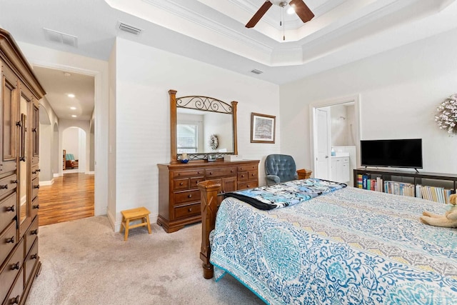 4951 Red Oak Dr, Milton, FL 32583 - bedroom with arched walkways, visible vents, light carpet, and ornamental molding