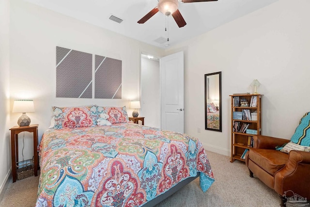 bedroom featuring ceiling fan and light colored carpet