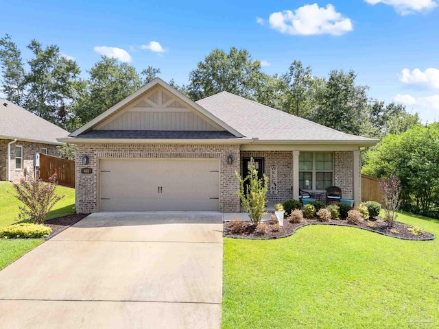 single story home with brick siding, concrete driveway, fence, a garage, and a front lawn