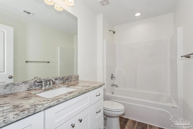 8512 Esplanade St, Navarre, FL 32566 - bathroom with toilet, tub / shower combination, wood finished floors, and vanity