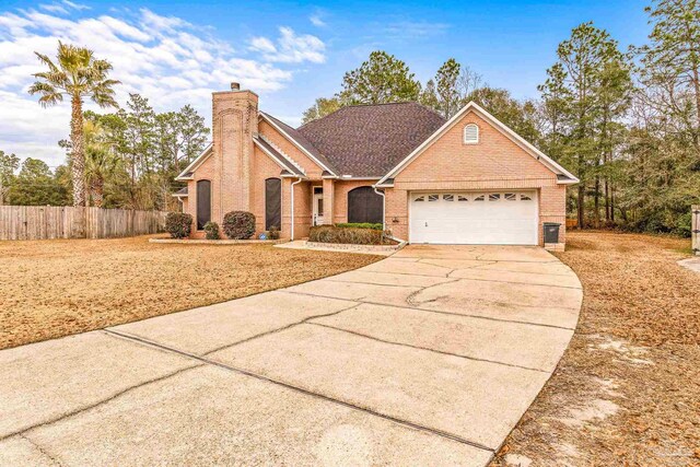 view of front of property featuring a garage