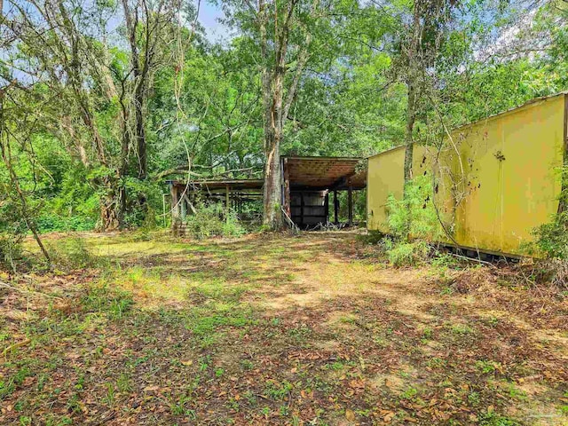6640 Frank Reeder Rd, Pensacola, FL 32526 - view of yard featuring an outdoor structure