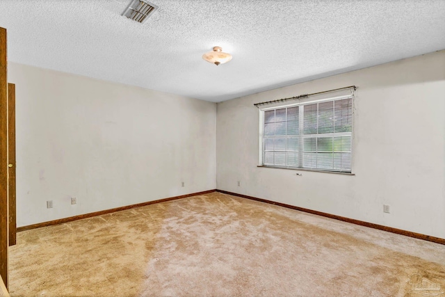 6640 Frank Reeder Rd, Pensacola, FL 32526 - empty room with carpet floors and a textured ceiling