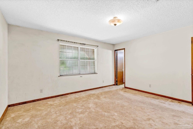 6640 Frank Reeder Rd, Pensacola, FL 32526 - empty room with carpet flooring and a textured ceiling