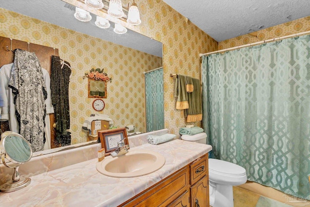 6640 Frank Reeder Rd, Pensacola, FL 32526 - full bath with vanity, wallpapered walls, a textured ceiling, and a shower with shower curtain