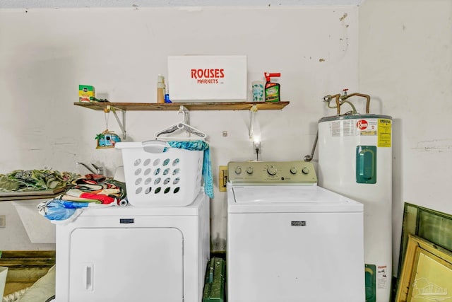6640 Frank Reeder Rd, Pensacola, FL 32526 - laundry room featuring washing machine and clothes dryer and electric water heater