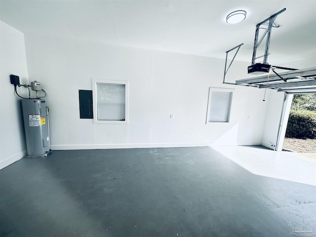 garage with a garage door opener, electric panel, and water heater