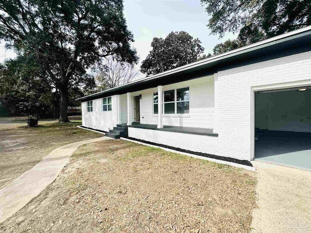 view of home's exterior with a yard