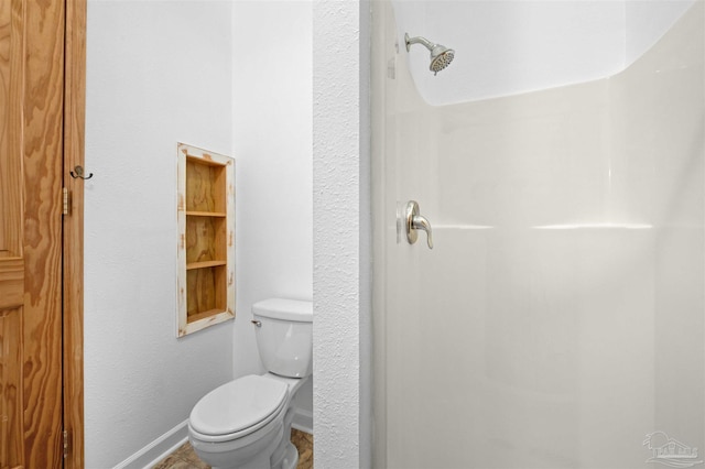 bathroom featuring toilet