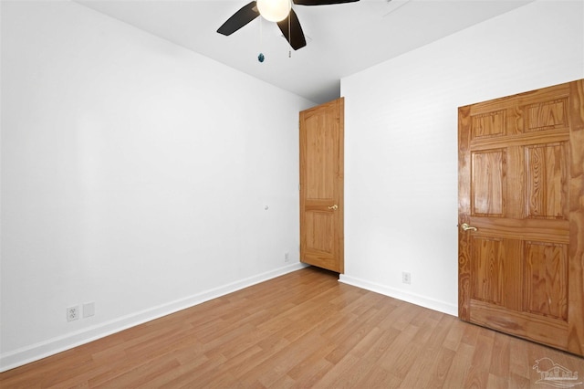 unfurnished bedroom featuring light hardwood / wood-style flooring and ceiling fan