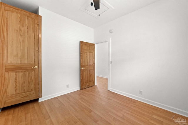 unfurnished bedroom with wood-type flooring and ceiling fan