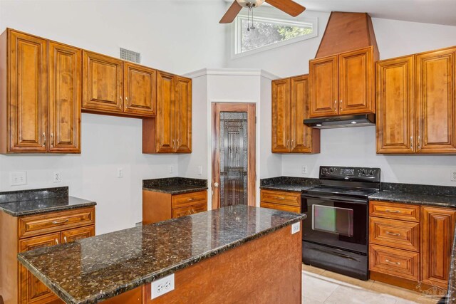 6814 Cedar Lake Dr, Pensacola, FL 32526 - kitchen featuring brown cabinets, under cabinet range hood, and black / electric stove