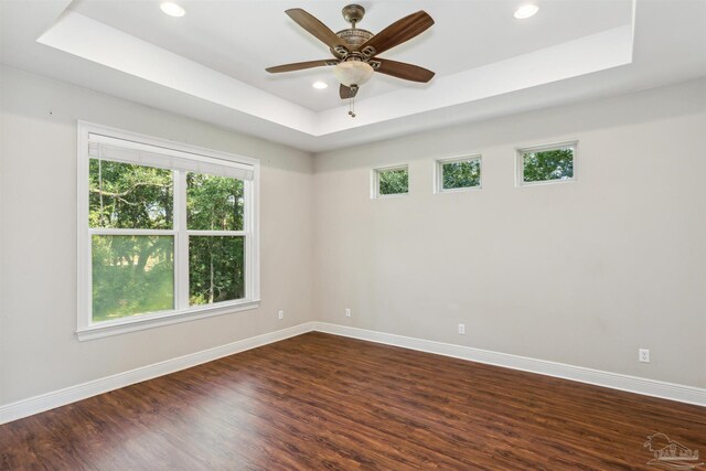 6814 Cedar Lake Dr, Pensacola, FL 32526 - spare room with a raised ceiling and baseboards