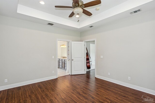 6814 Cedar Lake Dr, Pensacola, FL 32526 - unfurnished room featuring visible vents, a tray ceiling, and baseboards