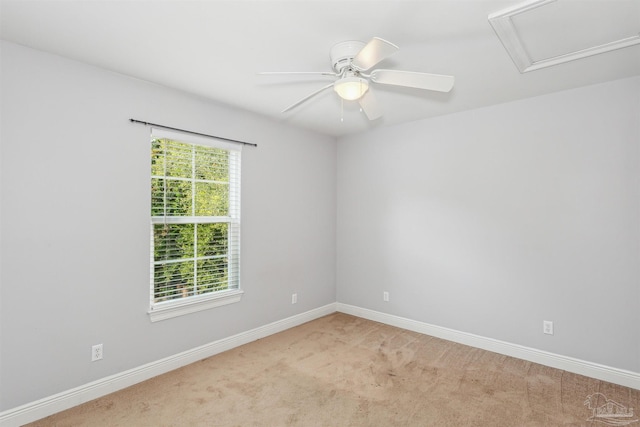 6814 Cedar Lake Dr, Pensacola, FL 32526 - empty room with attic access, baseboards, a ceiling fan, and light colored carpet