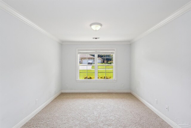 6814 Cedar Lake Dr, Pensacola, FL 32526 - spare room with baseboards, ornamental molding, visible vents, and light colored carpet