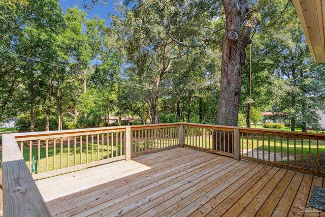 6814 Cedar Lake Dr, Pensacola, FL 32526 - deck featuring a lawn