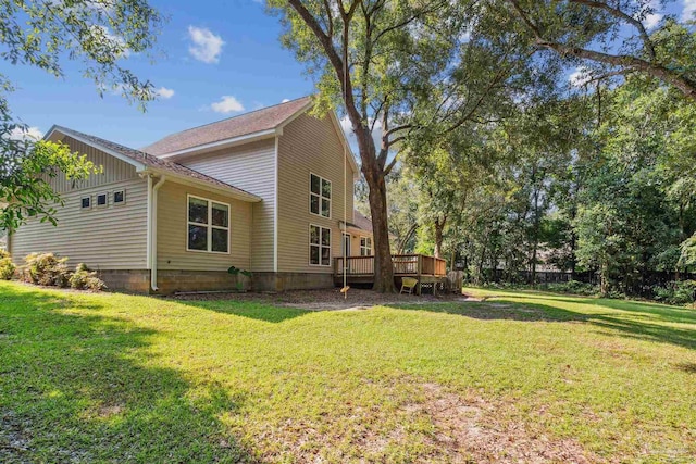 6814 Cedar Lake Dr, Pensacola, FL 32526 - view of side of home with a lawn and a wooden deck