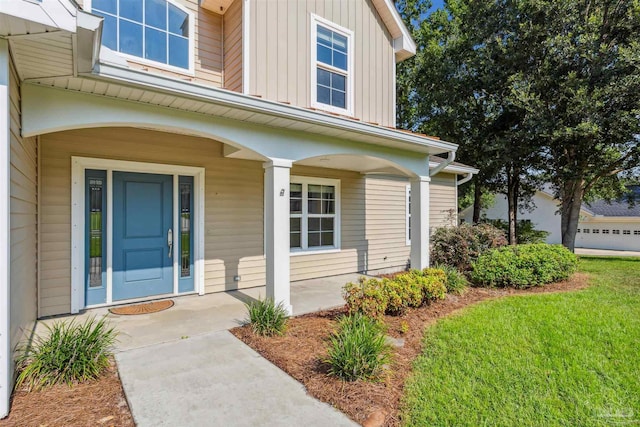 6814 Cedar Lake Dr, Pensacola, FL 32526 - property entrance featuring a porch and board and batten siding
