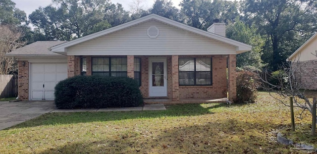 view of front facade featuring a garage, brick siding, concrete driveway, a chimney, and a front yard