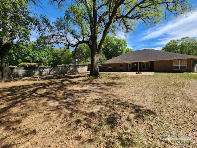 view of yard featuring fence