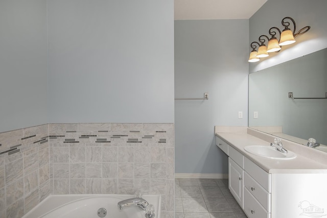 bathroom featuring a bathing tub, tile patterned flooring, and vanity