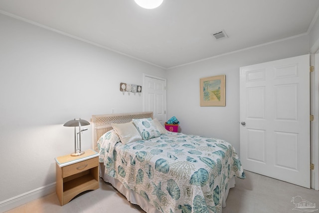 bedroom with ornamental molding