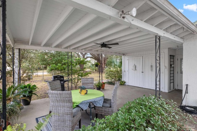 view of patio featuring ceiling fan