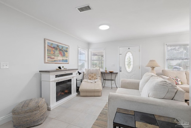 living room featuring light tile patterned flooring