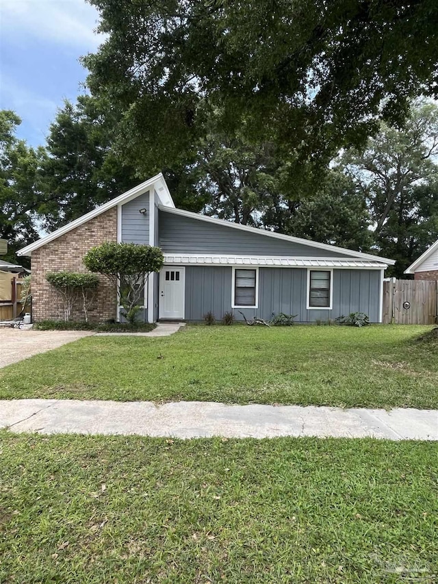 7402 Viewcrest Dr, Pensacola, FL 32504 - mid-century home with board and batten siding