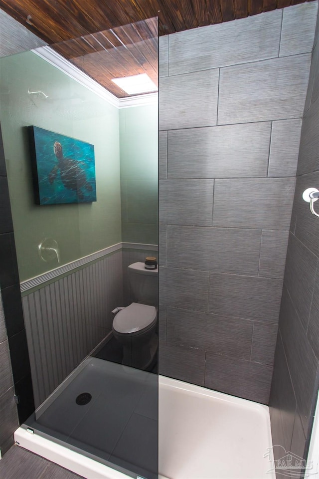 7402 Viewcrest Dr, Pensacola, FL 32504 - bathroom with a stall shower, toilet, and a wainscoted wall