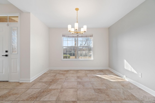 unfurnished dining area with a chandelier