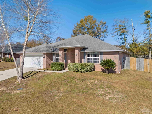 ranch-style house with a garage and a front lawn