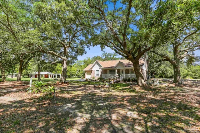 939 Avalon Blvd, Milton, FL 32583 - view of yard featuring covered porch
