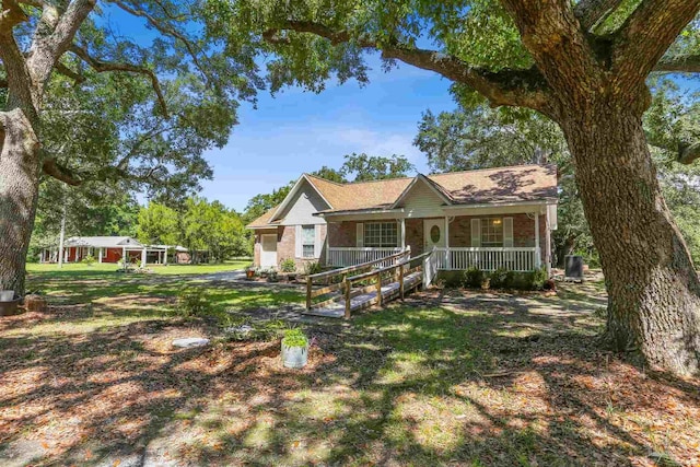 939 Avalon Blvd, Milton, FL 32583 - ranch-style home with a porch