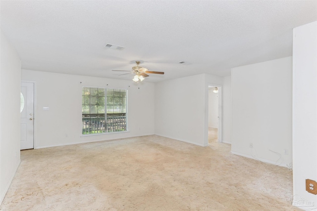 939 Avalon Blvd, Milton, FL 32583 - empty room with ceiling fan and light colored carpet