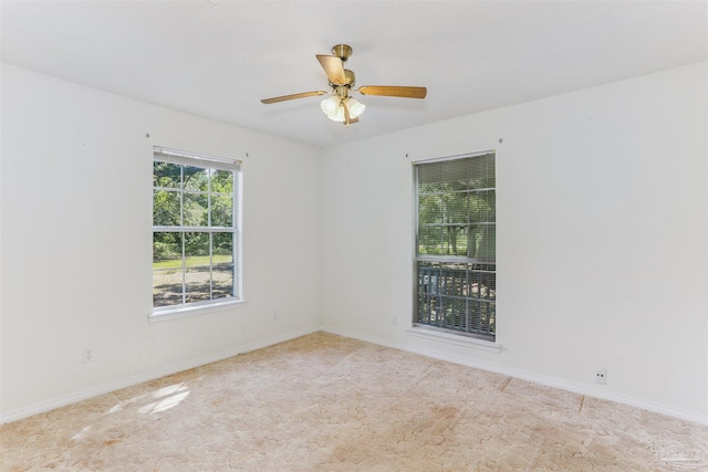 939 Avalon Blvd, Milton, FL 32583 - carpeted empty room featuring a ceiling fan and baseboards