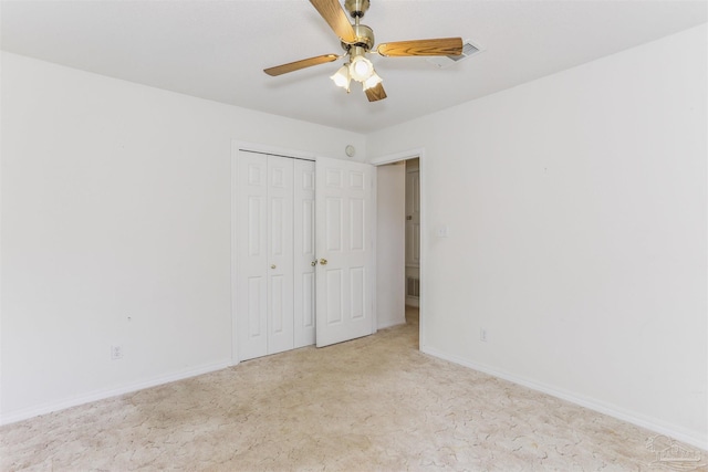 939 Avalon Blvd, Milton, FL 32583 - unfurnished bedroom featuring light colored carpet, a closet, and ceiling fan