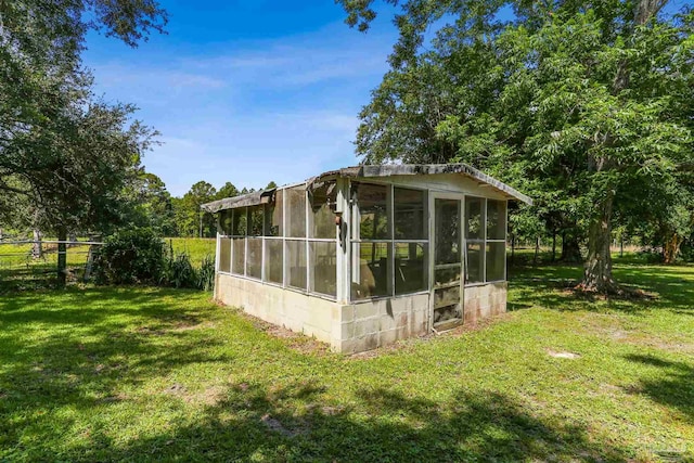 939 Avalon Blvd, Milton, FL 32583 - view of side of property featuring a sunroom