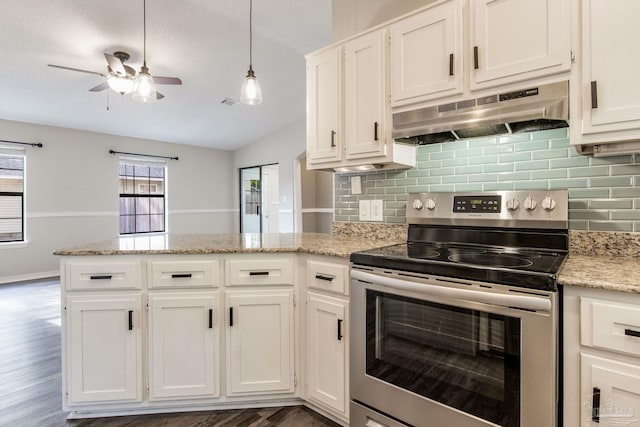 kitchen featuring decorative backsplash, white cabinets, a peninsula, stainless steel range with electric stovetop, and under cabinet range hood