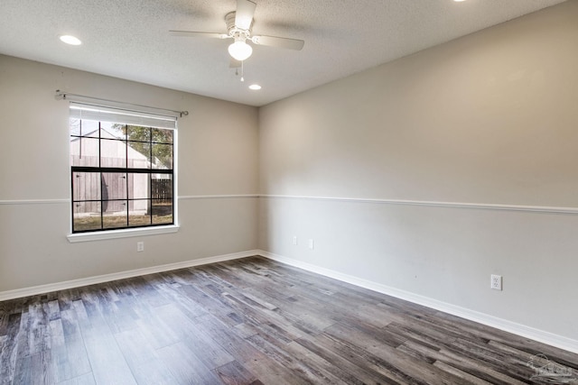 spare room with baseboards, a ceiling fan, wood finished floors, a textured ceiling, and recessed lighting