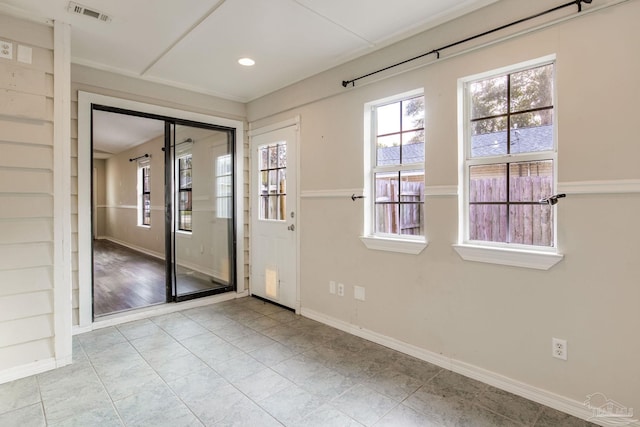 entryway featuring recessed lighting, visible vents, baseboards, and tile patterned floors