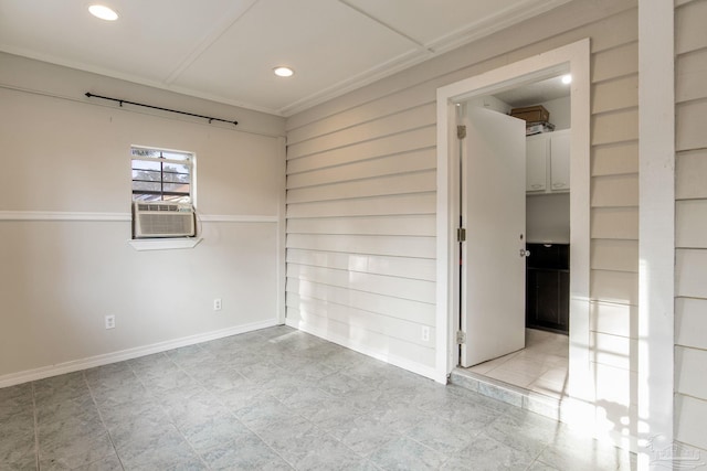 unfurnished room with cooling unit, baseboards, and recessed lighting