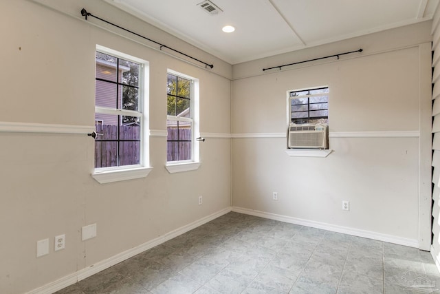 unfurnished room featuring baseboards, visible vents, cooling unit, and recessed lighting