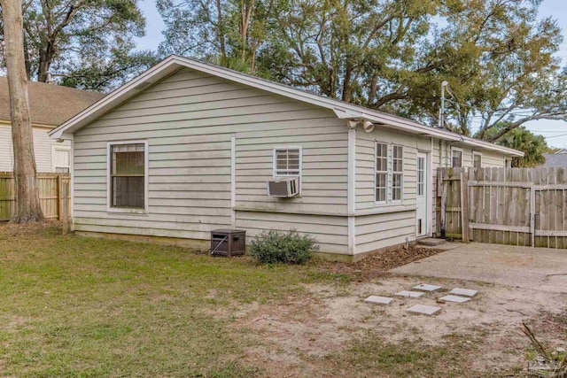 exterior space with a yard and fence