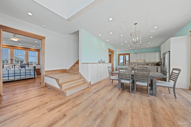 800 Via Deluna Dr, Pensacola Beach, FL 32561 - dining room featuring stairs, light wood-style flooring, and recessed lighting