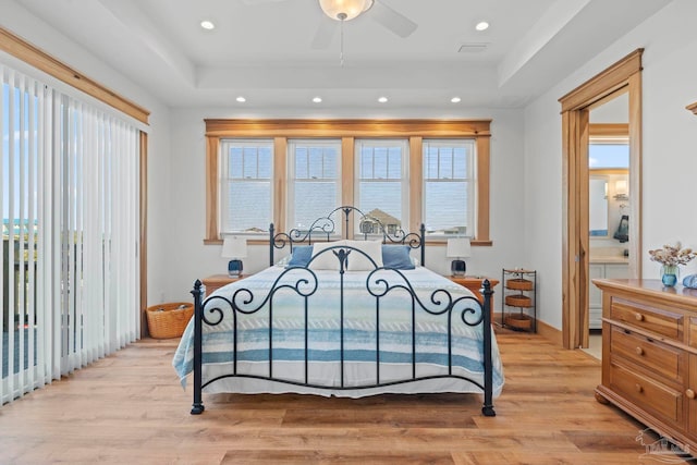 800 Via Deluna Dr, Pensacola Beach, FL 32561 - bedroom with recessed lighting, a raised ceiling, and light wood finished floors