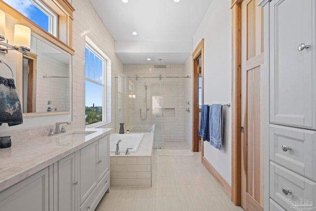 800 Via Deluna Dr, Pensacola Beach, FL 32561 - full bathroom with vanity, a shower stall, plenty of natural light, and a garden tub