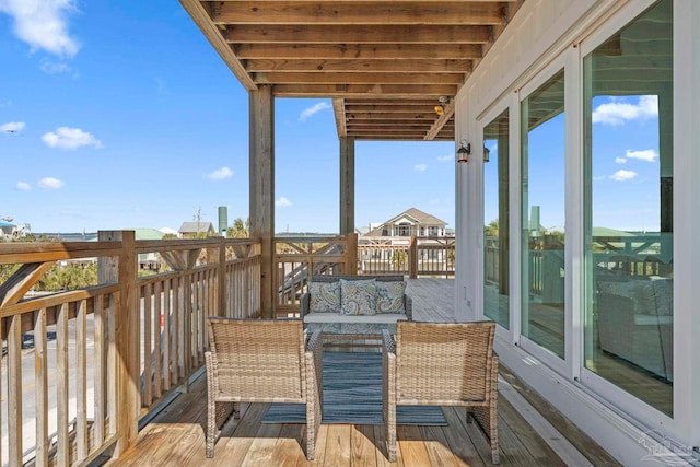 800 Via Deluna Dr, Pensacola Beach, FL 32561 - wooden deck with outdoor lounge area