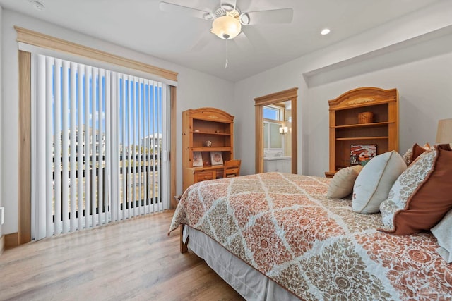 800 Via Deluna Dr, Pensacola Beach, FL 32561 - bedroom with recessed lighting, ensuite bathroom, wood finished floors, and a ceiling fan